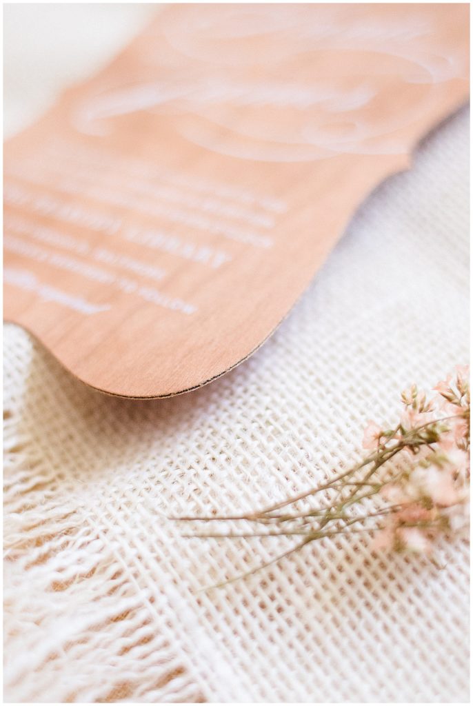 Real wood wedding invitation with rustic flowers